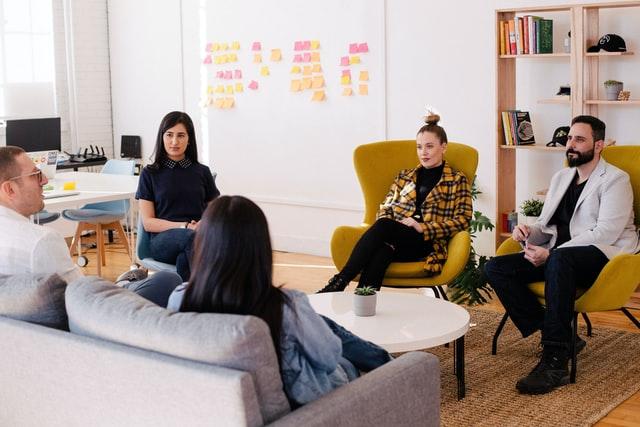 A small group of people in conversation.