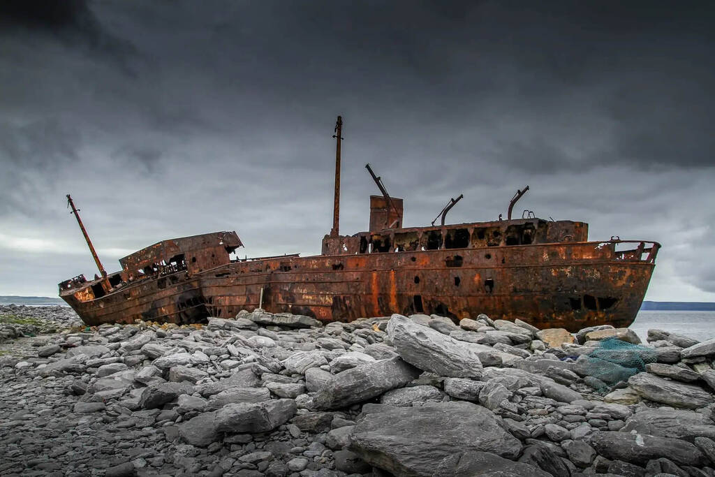 A rusty shipwreck.